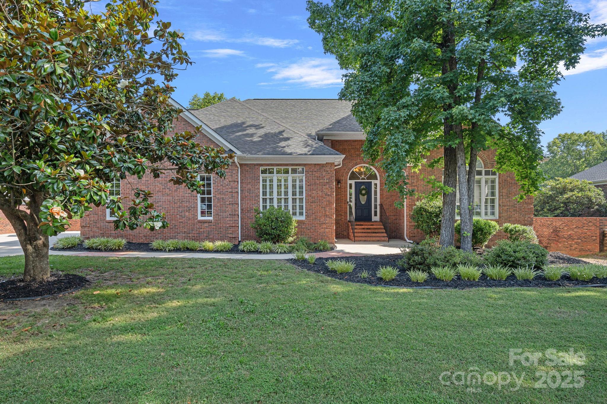 343 Gringley Hill Road Fort Mill, SC 29708 - Photo 38 of 45 a front view of a house with a garden