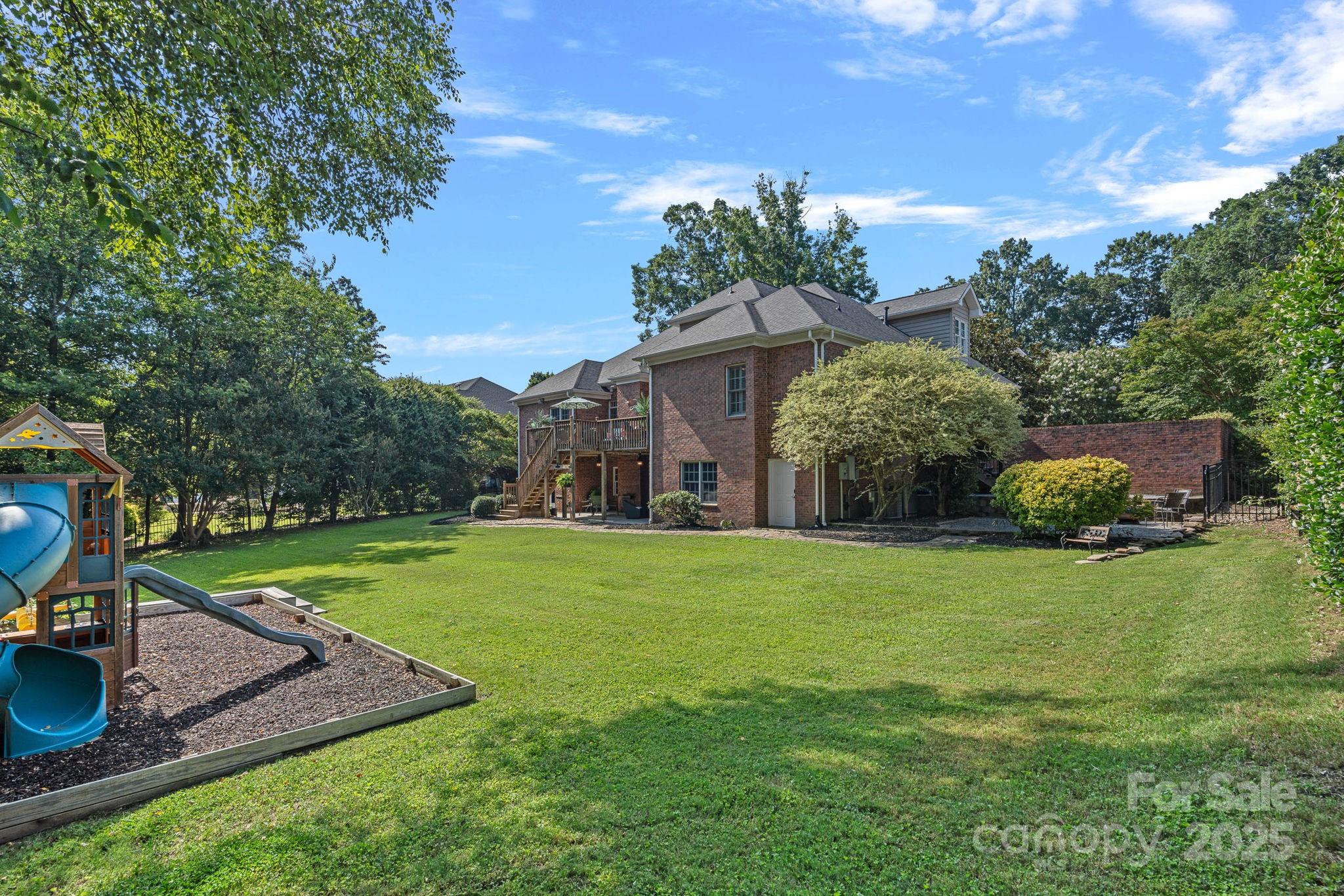 343 Gringley Hill Road Fort Mill, SC 29708 - Photo 39 of 45 a front view of a house with garden