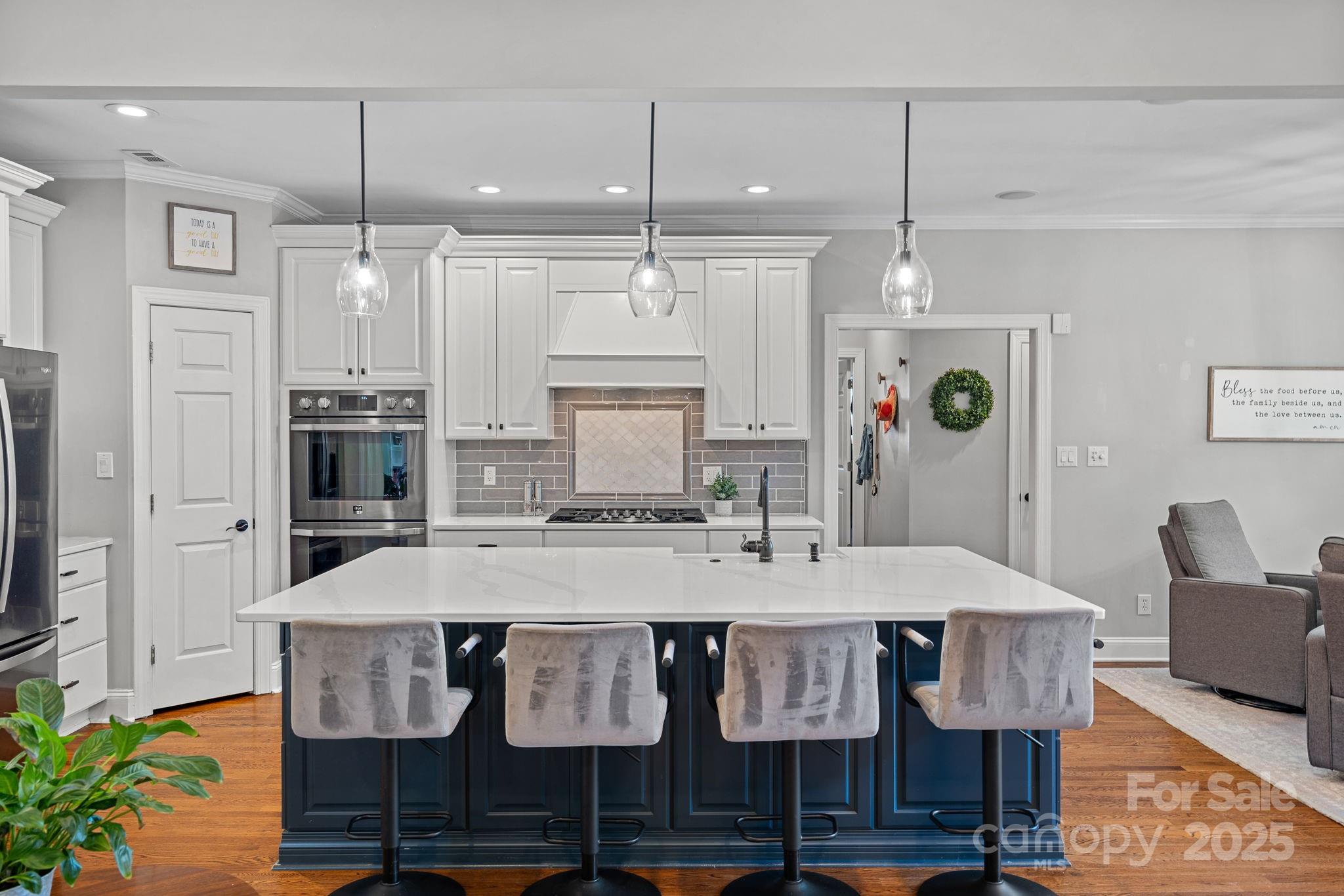 343 Gringley Hill Road Fort Mill, SC 29708 - Photo 4 of 45 a large kitchen with a table and chairs