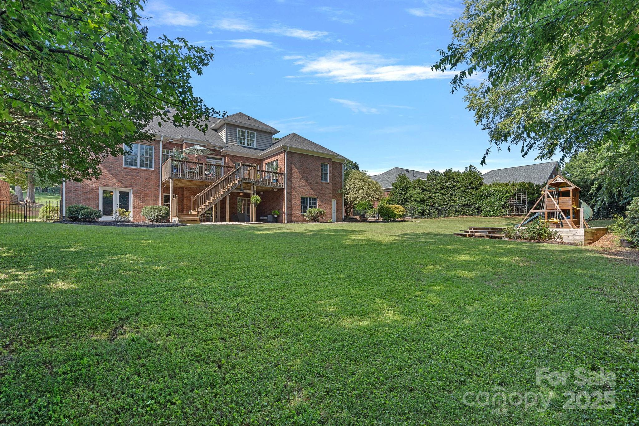 343 Gringley Hill Road Fort Mill, SC 29708 - Photo 41 of 45 a view of a house with a big yard