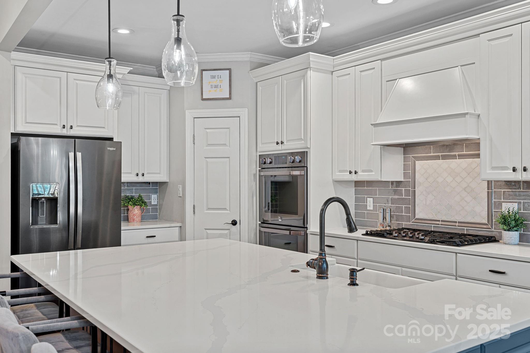 343 Gringley Hill Road Fort Mill, SC 29708 - Photo 6 of 45 a kitchen with refrigerator and cabinets