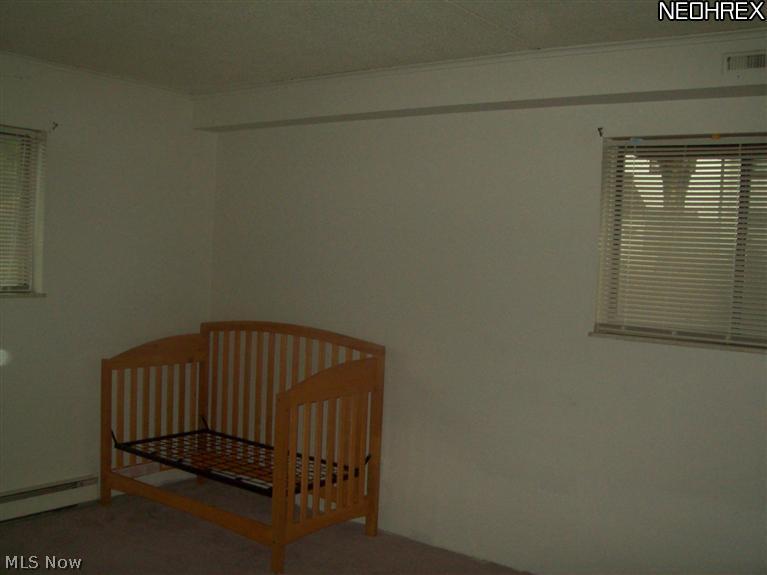 9956 Johnnycake Ridge Road, Unit L3 Painesville, OH 44077 - Photo 5 of 15 Bedroom 1