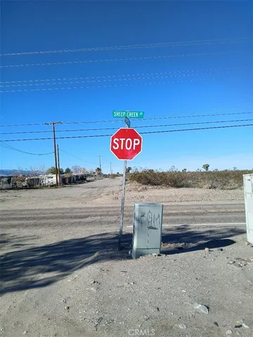 a view of a street with an outdoor space