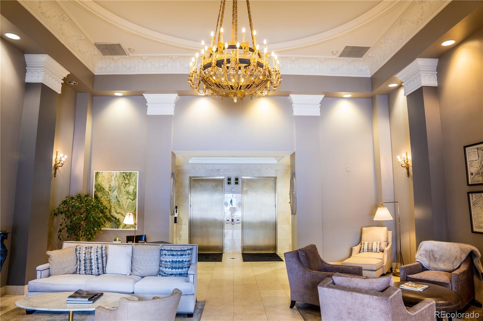 475 West 12th Avenue, Unit 15G Denver, CO 80204 - Photo 15 of 15 a living room with furniture and a chandelier