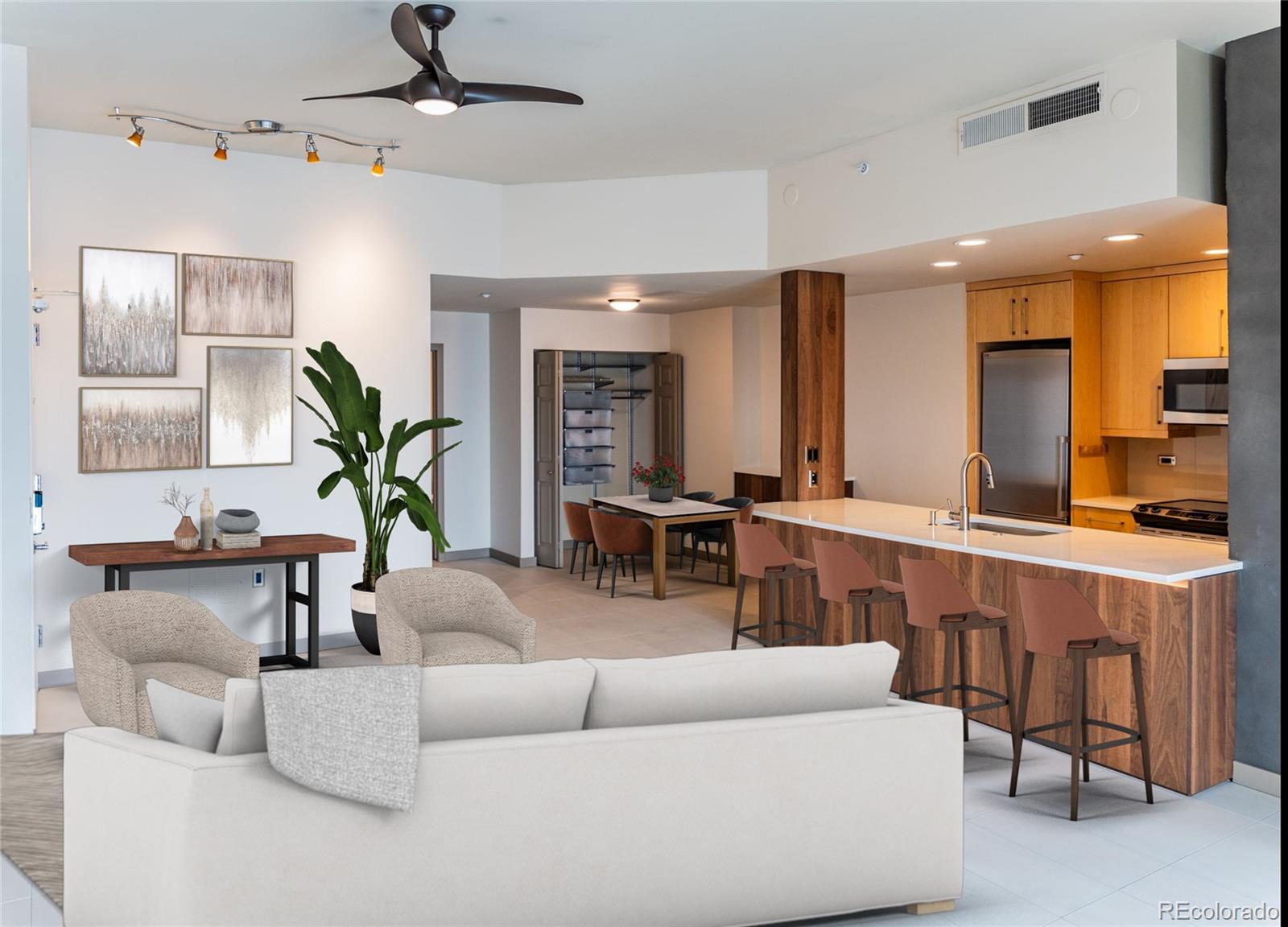 475 West 12th Avenue, Unit 15G Denver, CO 80204 - Photo 4 of 15 a living room with furniture and a large window