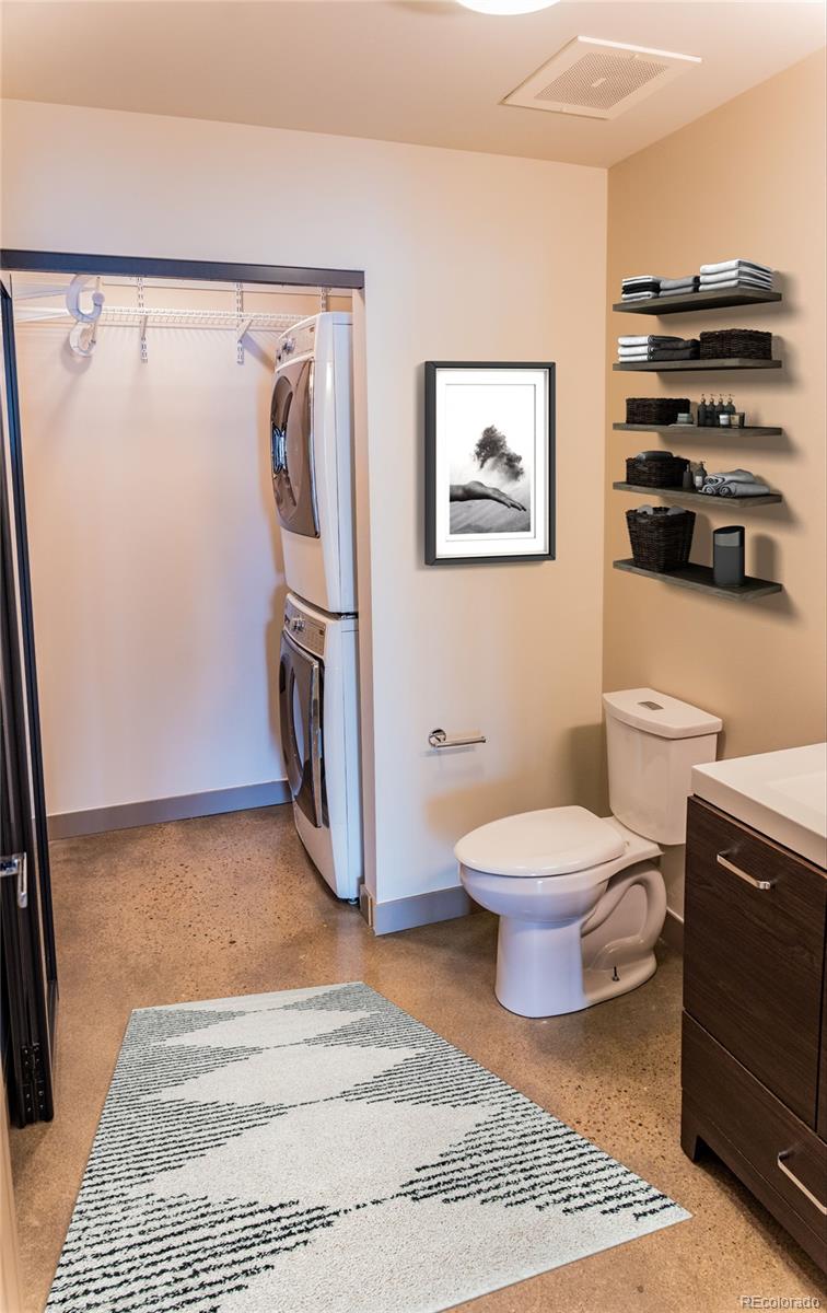 475 West 12th Avenue, Unit 15G Denver, CO 80204 - Photo 7 of 15 a bathroom with a toilet and a shower