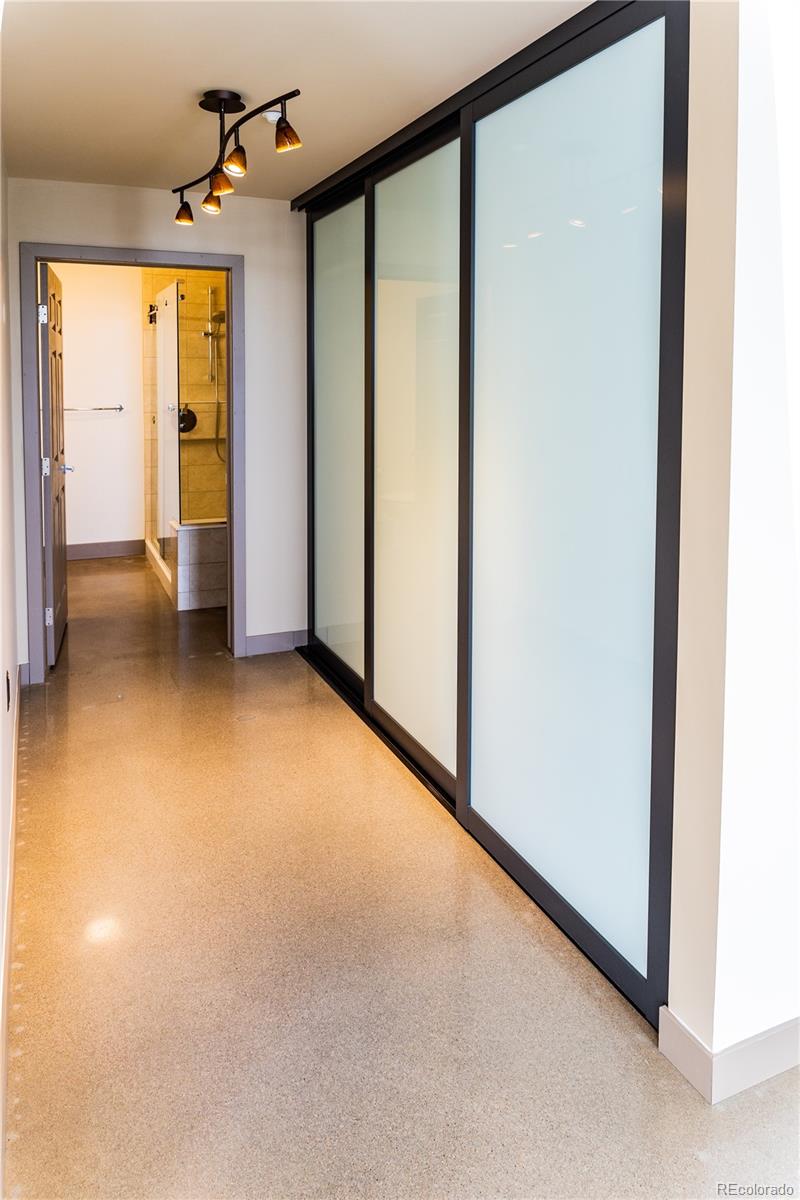 475 West 12th Avenue, Unit 15G Denver, CO 80204 - Photo 10 of 15 a view of a room with large windows