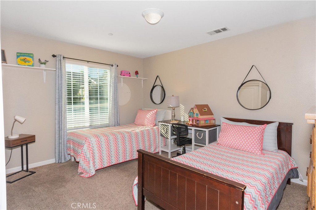 945 Creston Road Paso Robles, CA 93446 - Photo 12 of 13 a bedroom with two beds and a window