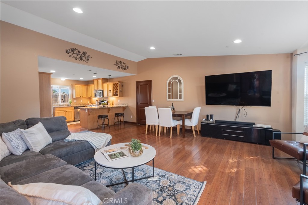 945 Creston Road Paso Robles, CA 93446 - Photo 3 of 13 a living room with furniture and a flat screen tv