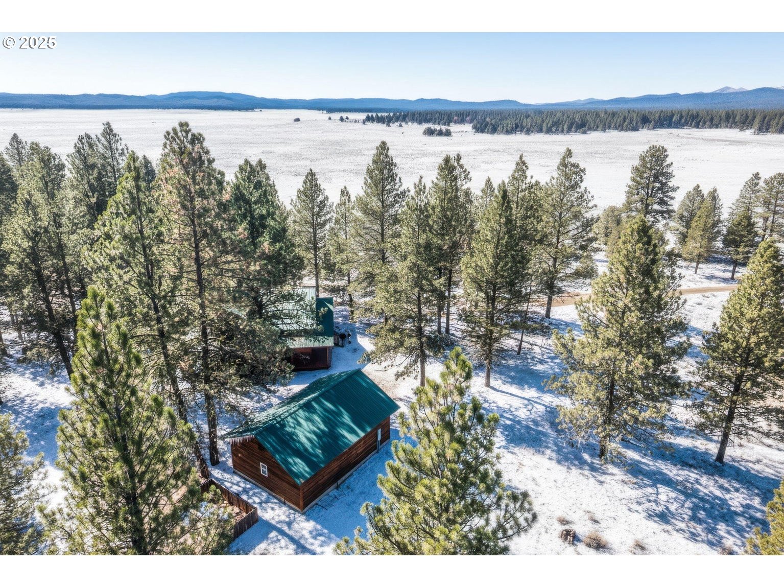 20779 Bear Gulch Road Canyon City, OR 97820 - Photo 2 of 35 a view of a city and lake from a yard