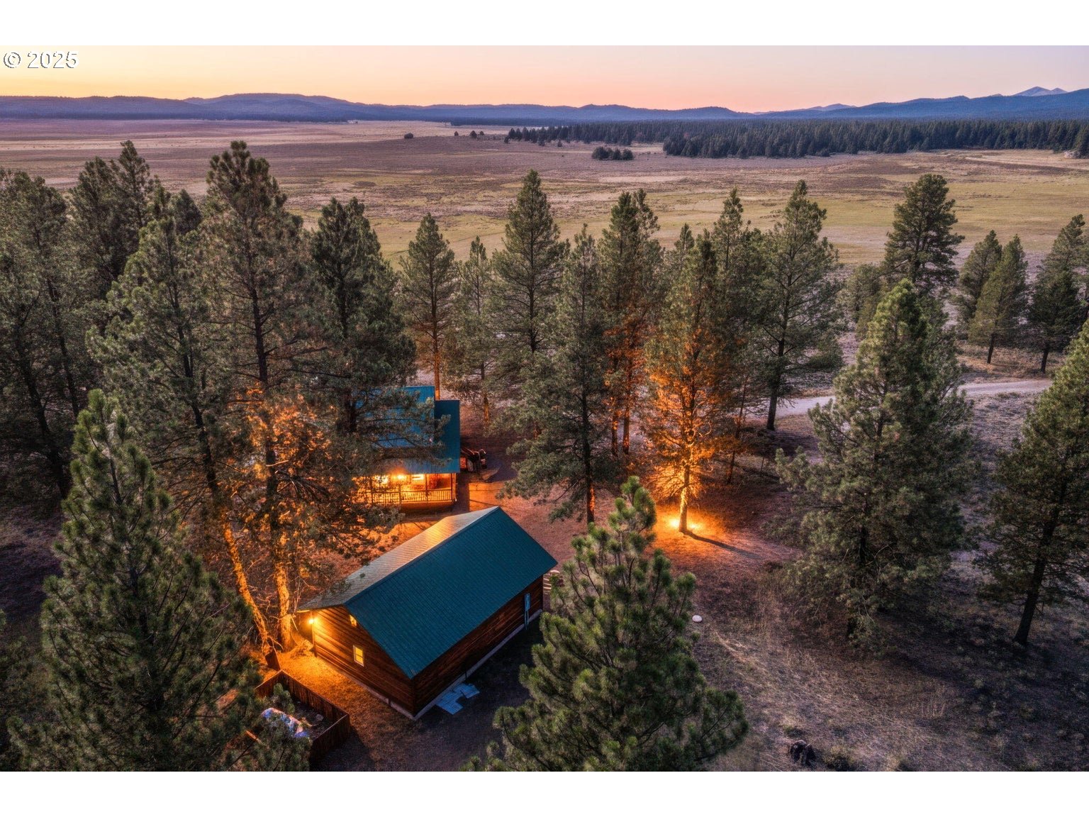 20779 Bear Gulch Road Canyon City, OR 97820 - Photo 4 of 35 a view of a city with sunset view