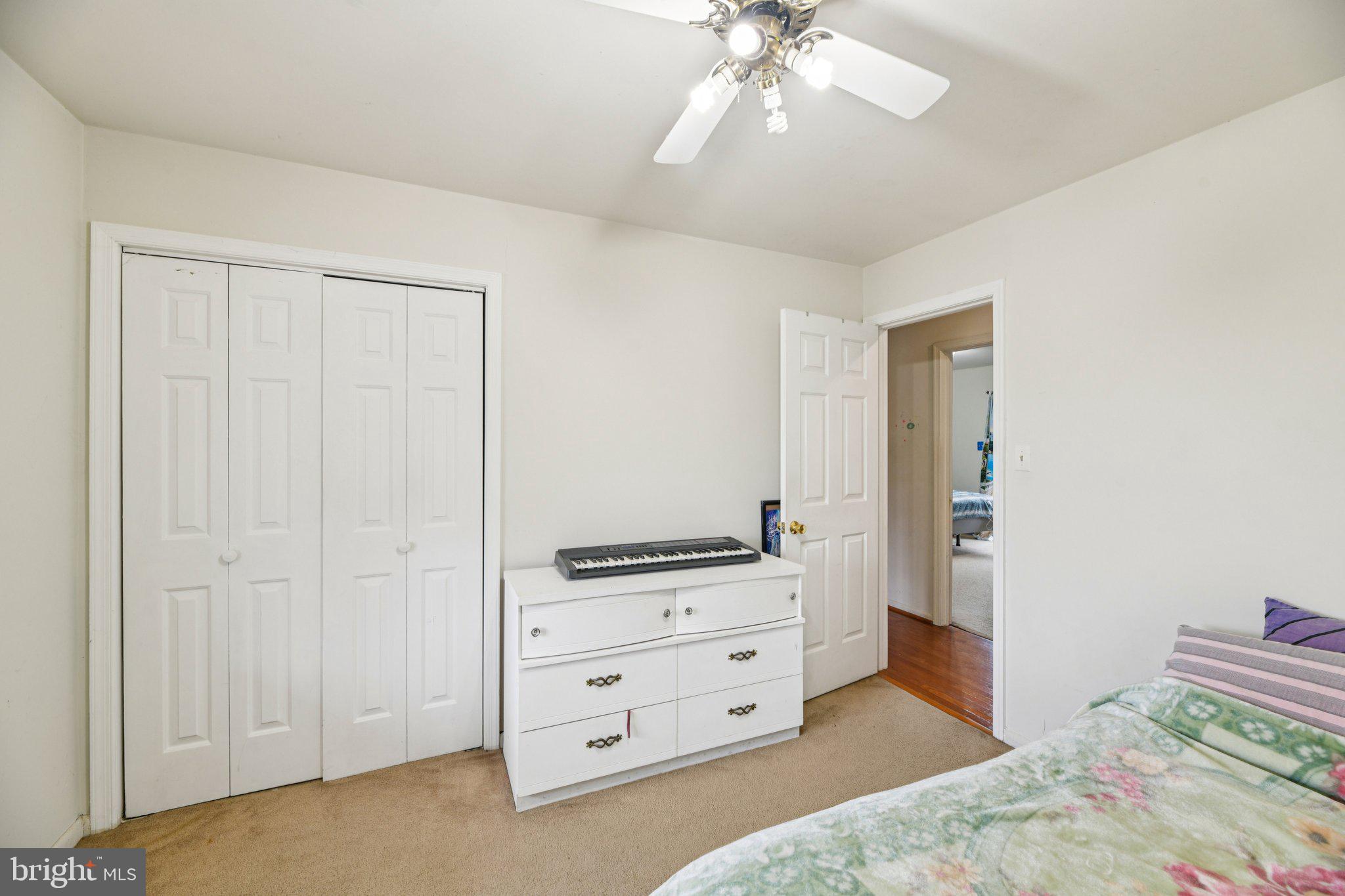 2650 Solomons Island Road Huntingtown, MD 20639 - Photo 19 of 44 a view of room with cabinet and ceiling fan