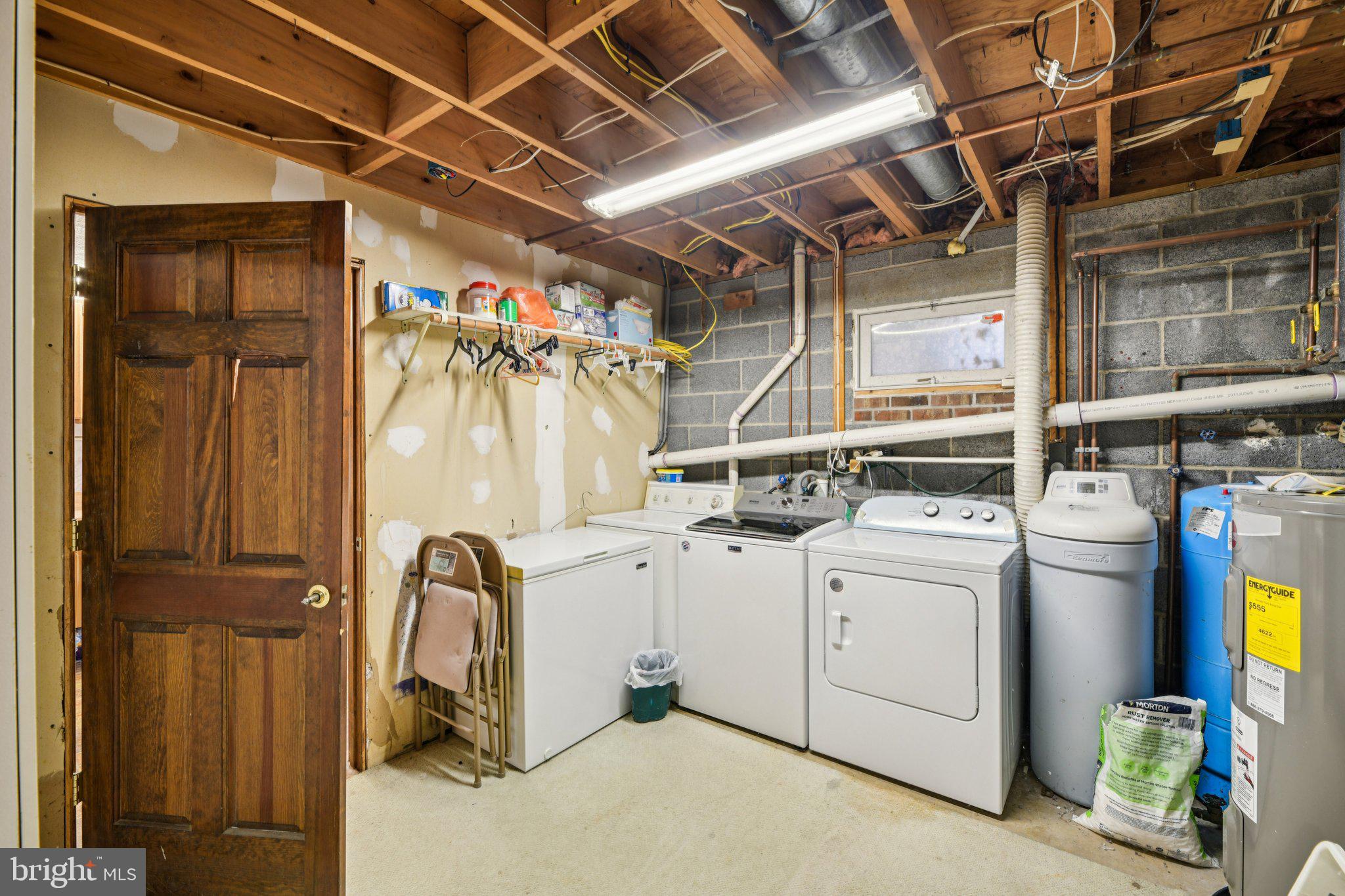 2650 Solomons Island Road Huntingtown, MD 20639 - Photo 34 of 44 a utility room with dryer and washer