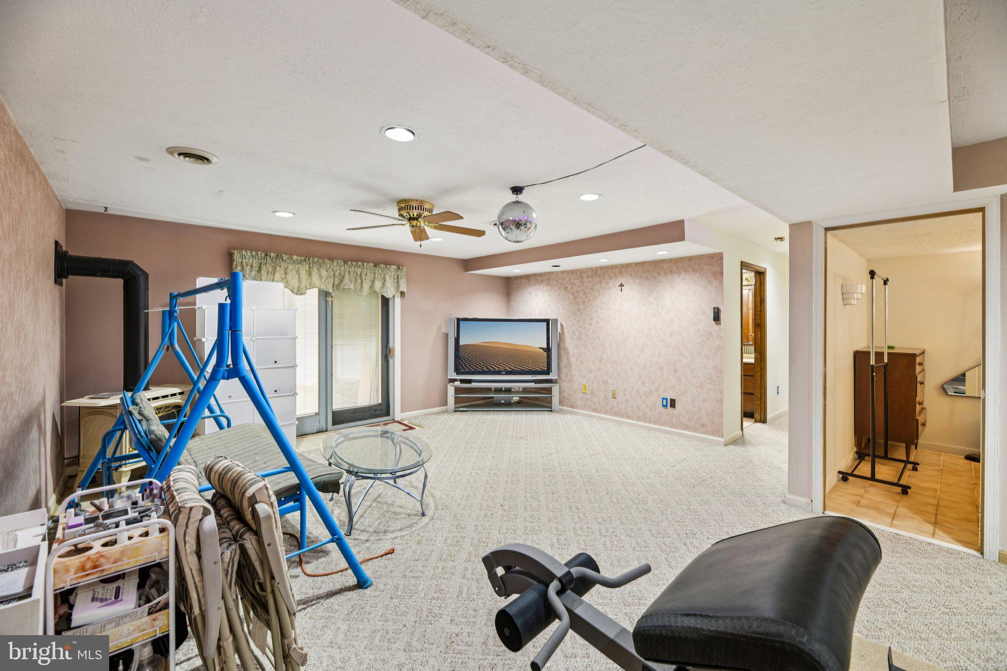 2650 Solomons Island Road Huntingtown, MD 20639 - Photo 36 of 44 a room with furniture and a large window