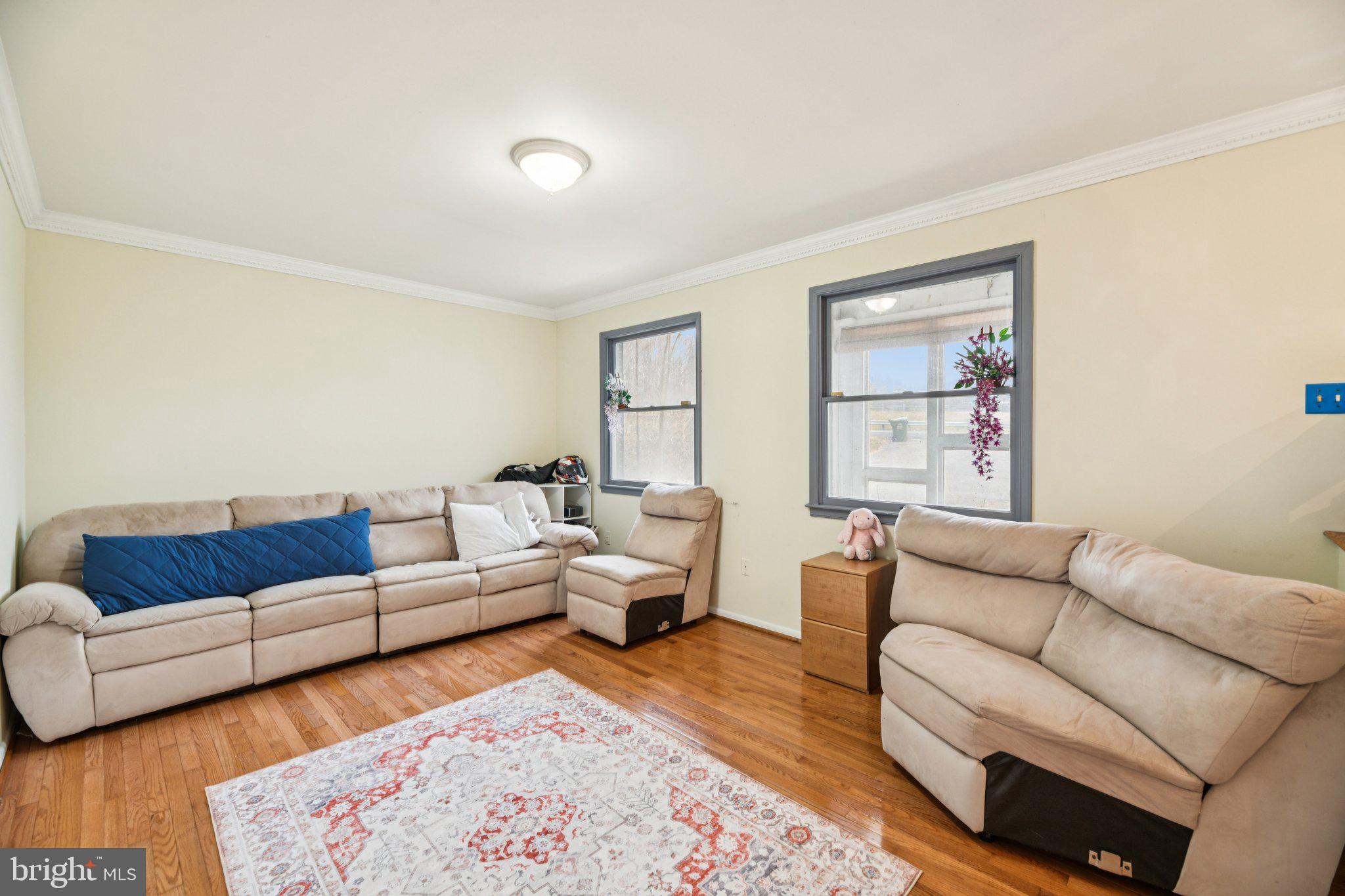 2650 Solomons Island Road Huntingtown, MD 20639 - Photo 6 of 44 a living room with furniture and a couch