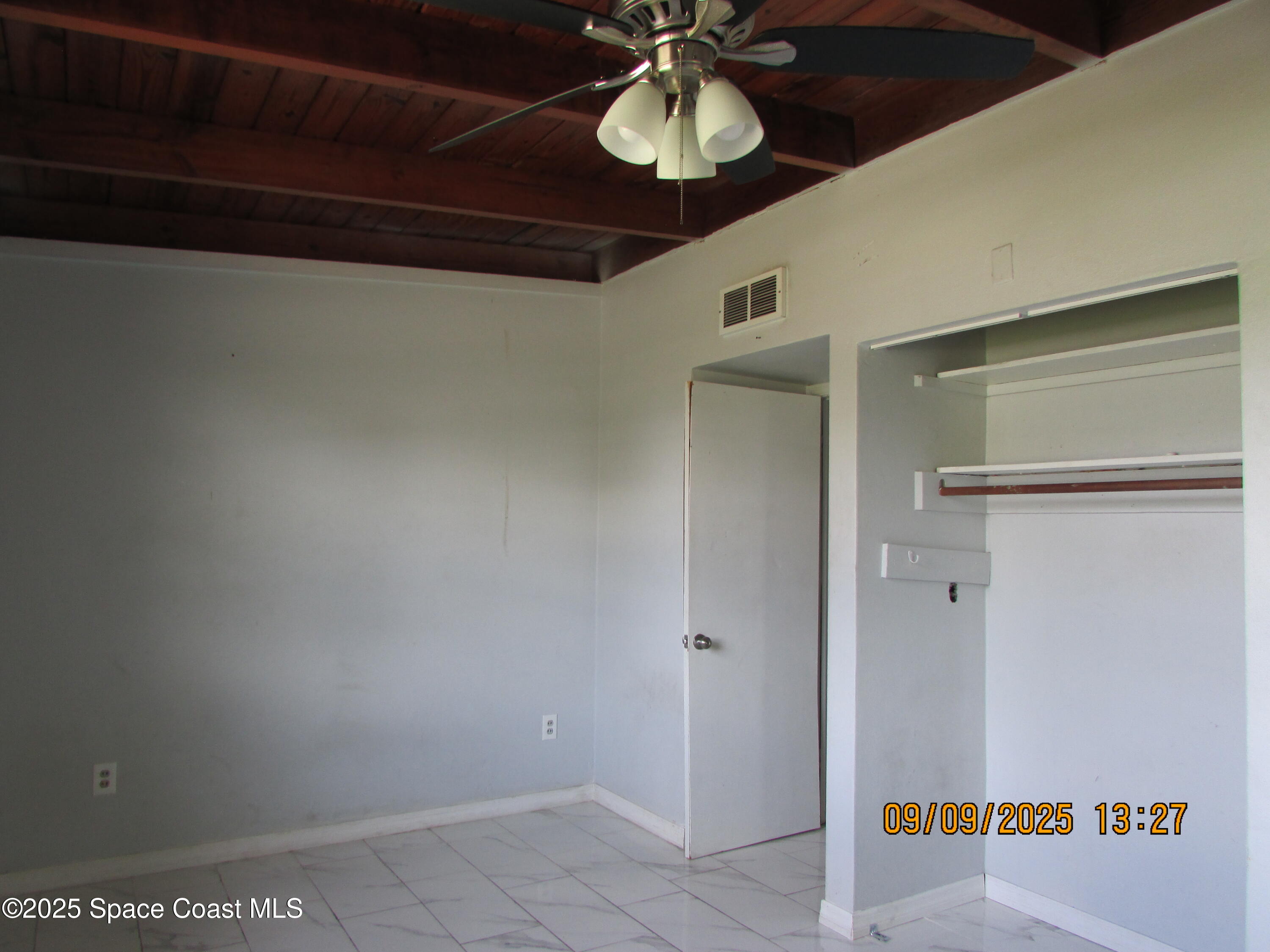 1647 Dixie Way Melbourne, FL 32935 - Photo 13 of 15 a view of a hallway with a elevator