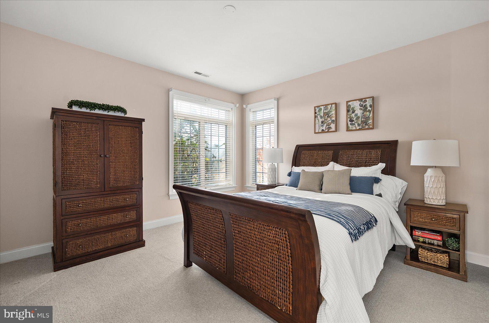 12901 Old Bridge Road, Unit PH8 2 Ocean City, MD 21842 - Photo 48 of 79 a bedroom with a bed and a window