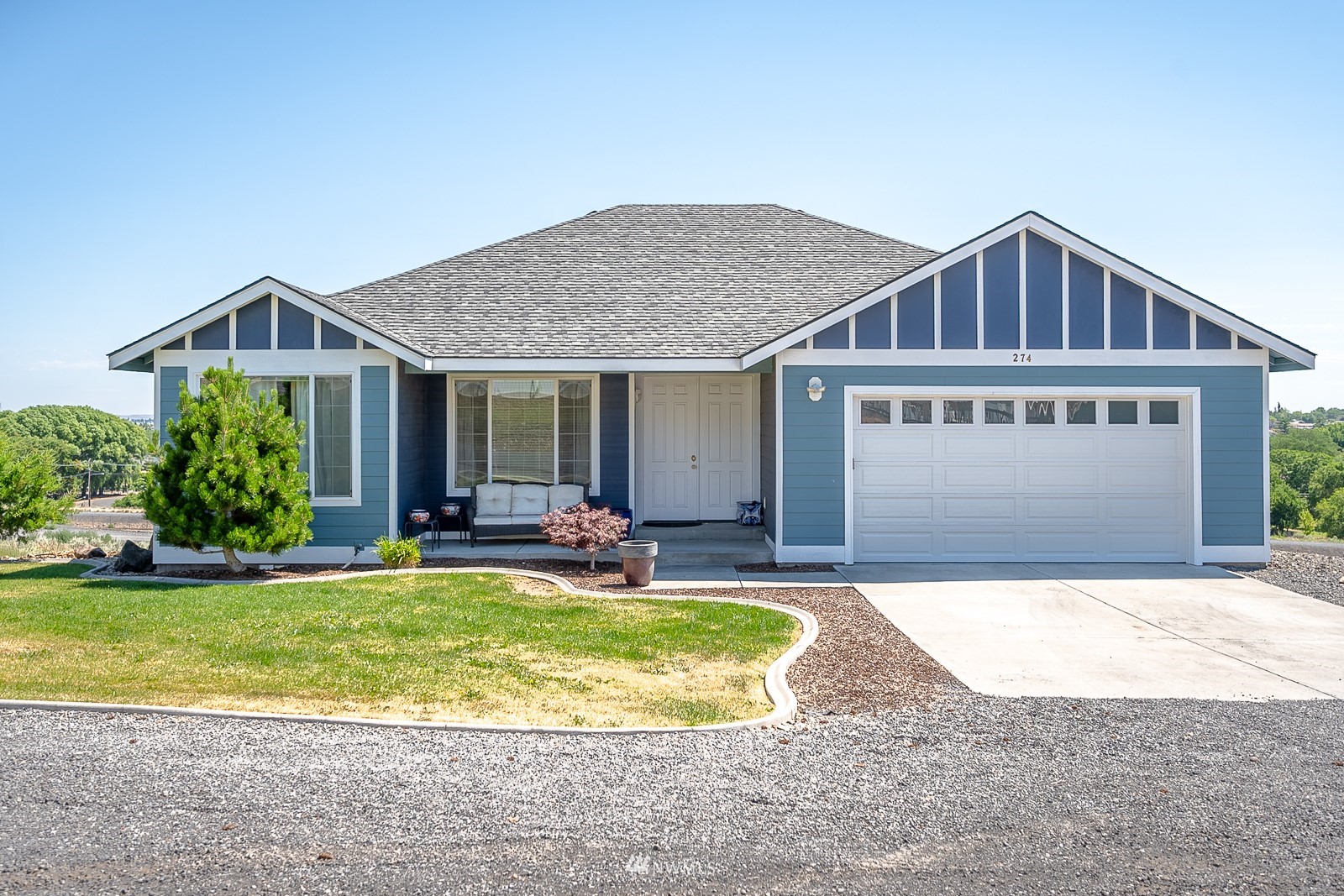 274 Strand Road Ephrata, WA 98823 - Photo 1 of 39 a view of a house with a yard and sitting area