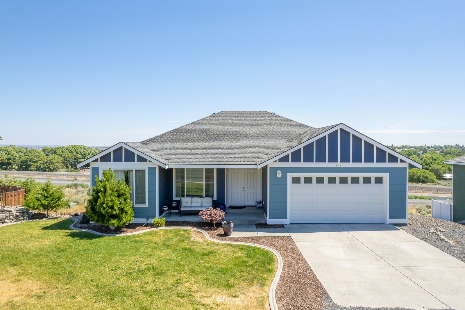274 Strand Road Ephrata, WA 98823 - Photo 3 of 39 a front view of a house with swimming pool