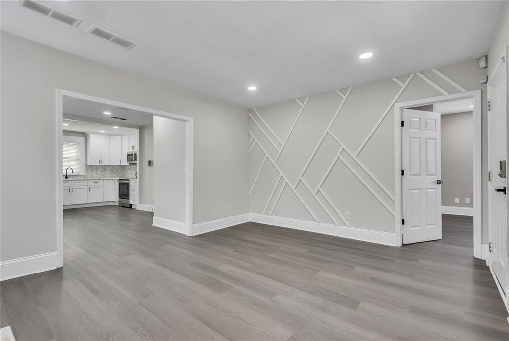 2300 Dauphine Street Atlanta, GA 30344 - Photo 16 of 34 a view of an empty room and wooden floor