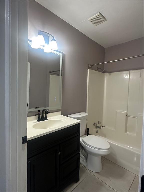 2300 Dauphine Street Atlanta, GA 30344 - Photo 23 of 34 a bathroom with a sink a toilet and shower