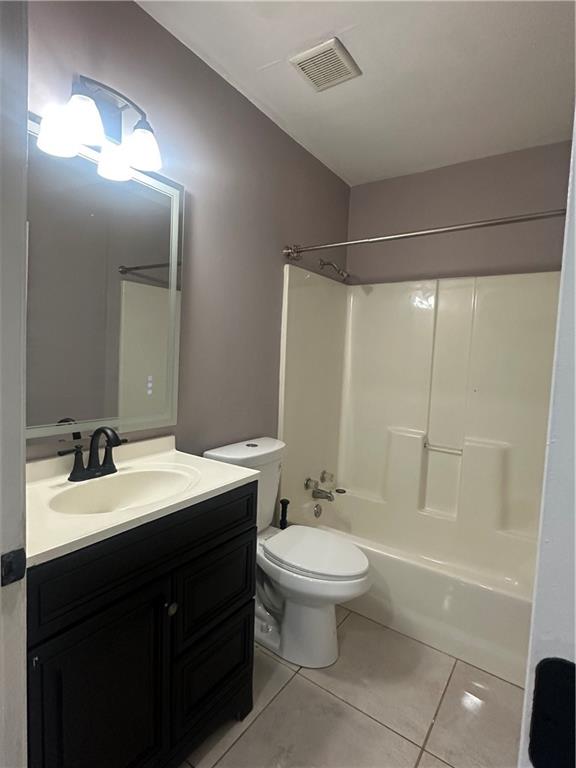 2300 Dauphine Street Atlanta, GA 30344 - Photo 24 of 34 a bathroom with a double vanity sink toilet and shower