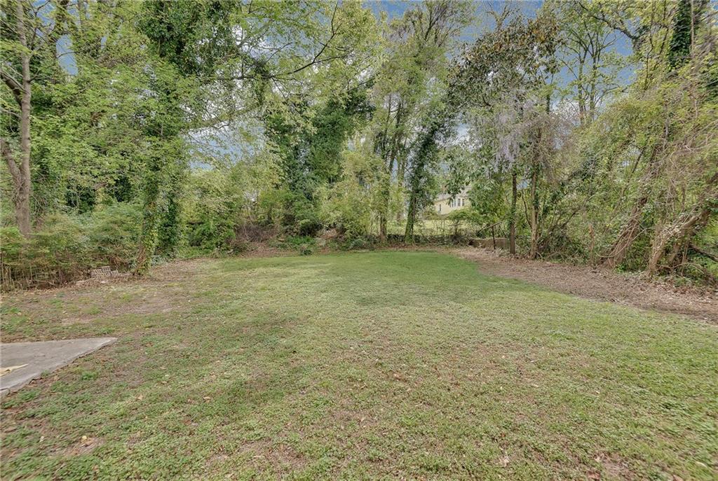 2300 Dauphine Street Atlanta, GA 30344 - Photo 33 of 34 a view of a field with trees in the background