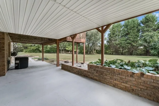 a view of a room with porch and outdoor space