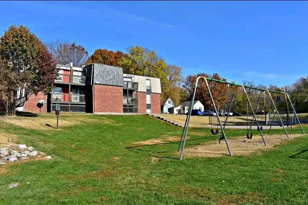 a view of a park with swings