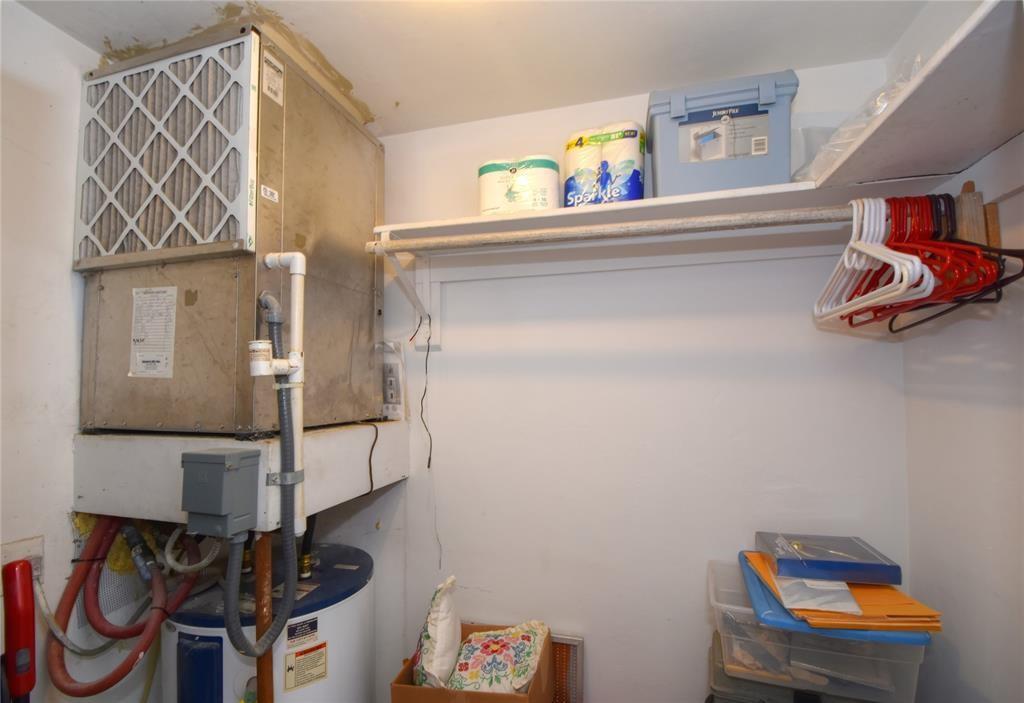 1951 Northeast 39th Street, Unit 360 Lighthouse Point, FL 33064 - Photo 21 of 28 a view of storage and utility room