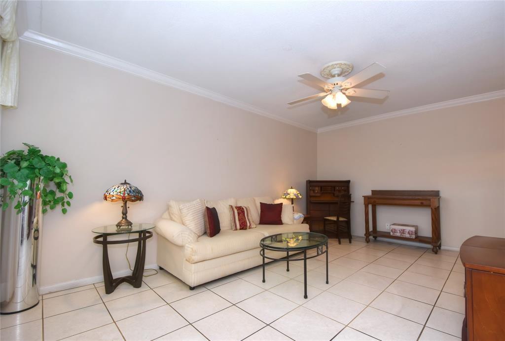 1951 Northeast 39th Street, Unit 360 Lighthouse Point, FL 33064 - Photo 10 of 28 a living room with furniture and a fireplace