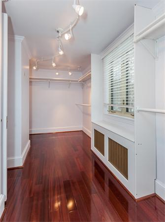 368 Longhill Street Springfield, MA 01108 - Photo 17 of 30 a view of an empty room with wooden floor and a window