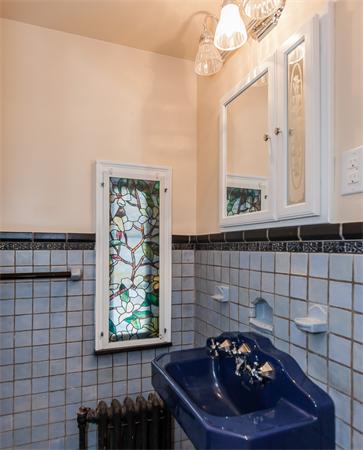 368 Longhill Street Springfield, MA 01108 - Photo 22 of 30 a bathroom with a sink and a mirror