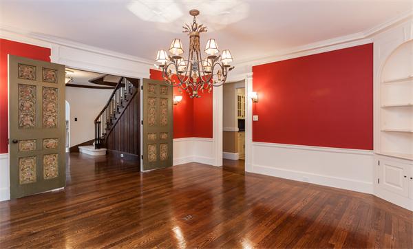 368 Longhill Street Springfield, MA 01108 - Photo 7 of 30 a view of a livingroom with wooden floor and stairs