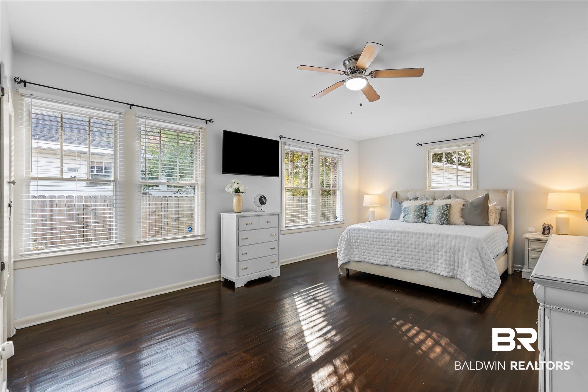 180 Williams Street Mobile, AL 36606 - Photo 11 of 20 Bedroom featuring ceiling fan and dark hardwood / wood-style floors