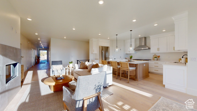 683 North Heritage Street Mapleton, UT 84664 - Photo 10 of 40 Living room with light wood finished floors and recessed lighting
