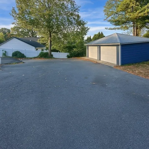 a view of a house with a street