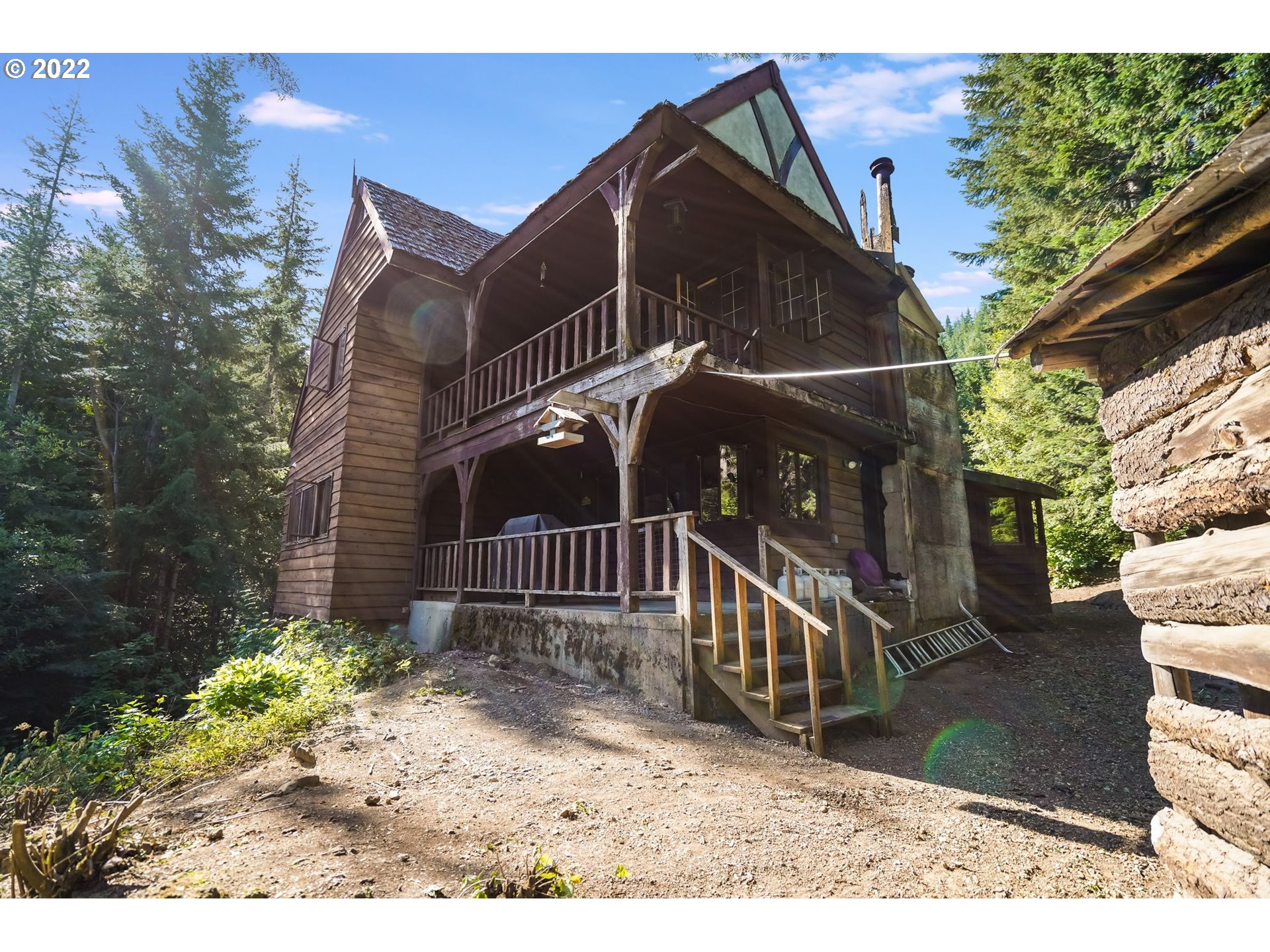 277 Trout Lake Creek Road Trout Lake, WA 98650 - Photo 15 of 35 a view of a house with a small yard