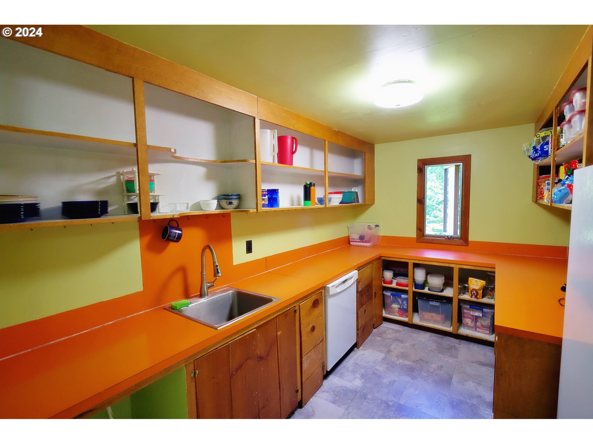 277 Trout Lake Creek Road Trout Lake, WA 98650 - Photo 18 of 35 a kitchen with a sink a counter top space and cabinets
