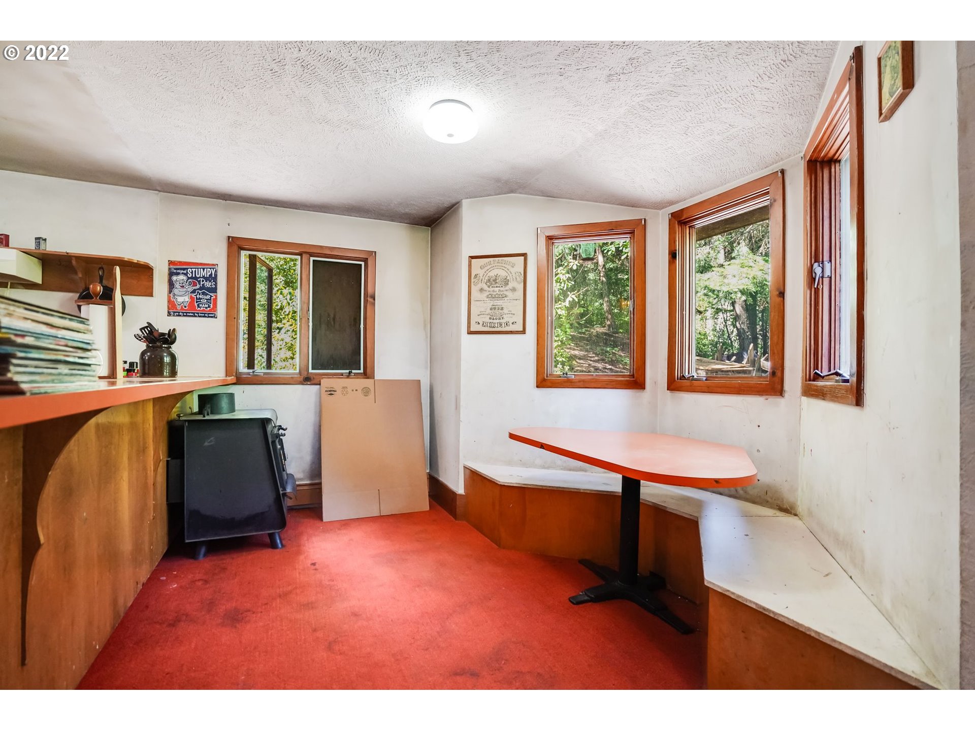 277 Trout Lake Creek Road Trout Lake, WA 98650 - Photo 20 of 35 a living room with furniture and a large window
