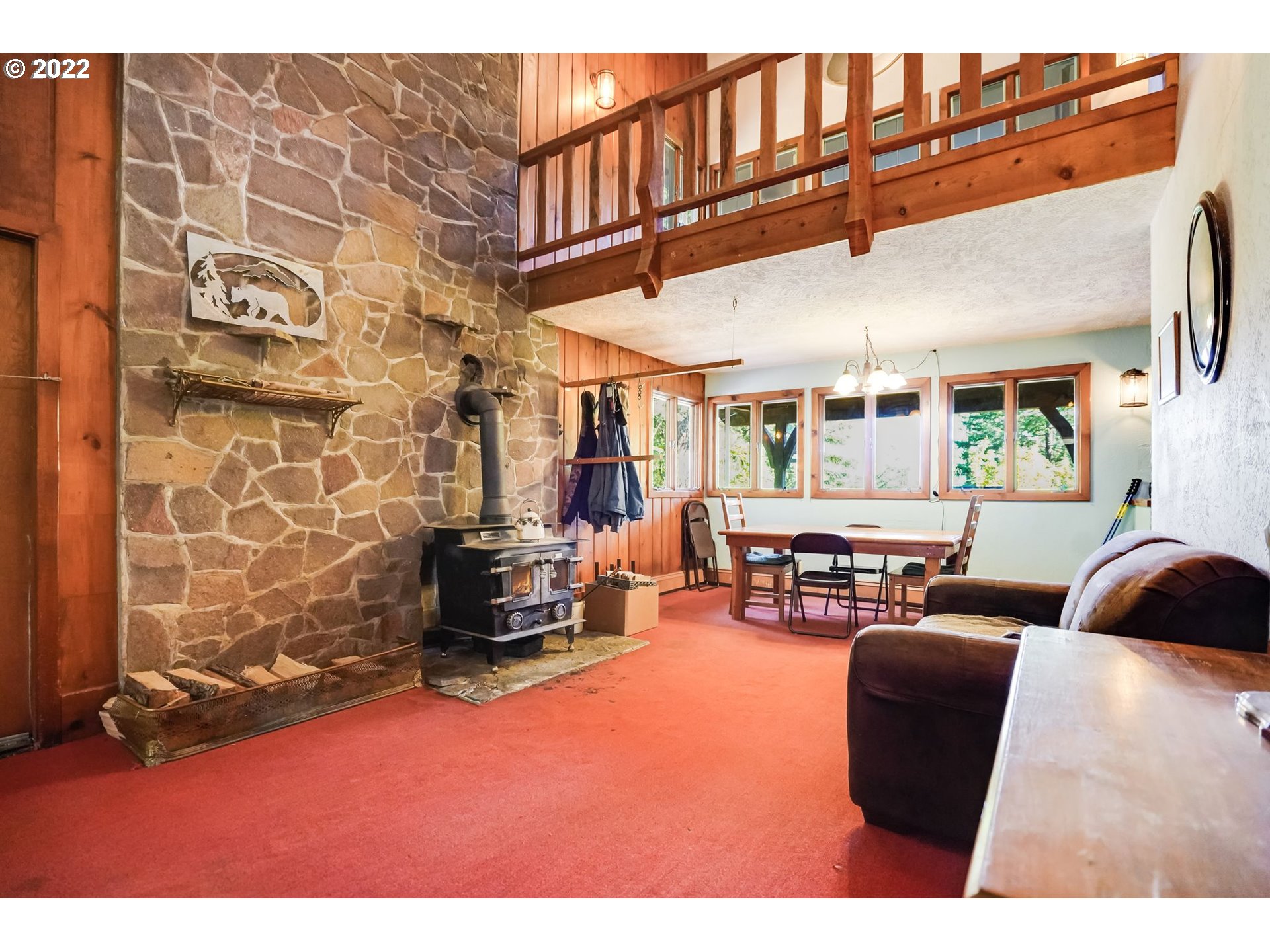 277 Trout Lake Creek Road Trout Lake, WA 98650 - Photo 21 of 35 a living room with furniture a fireplace