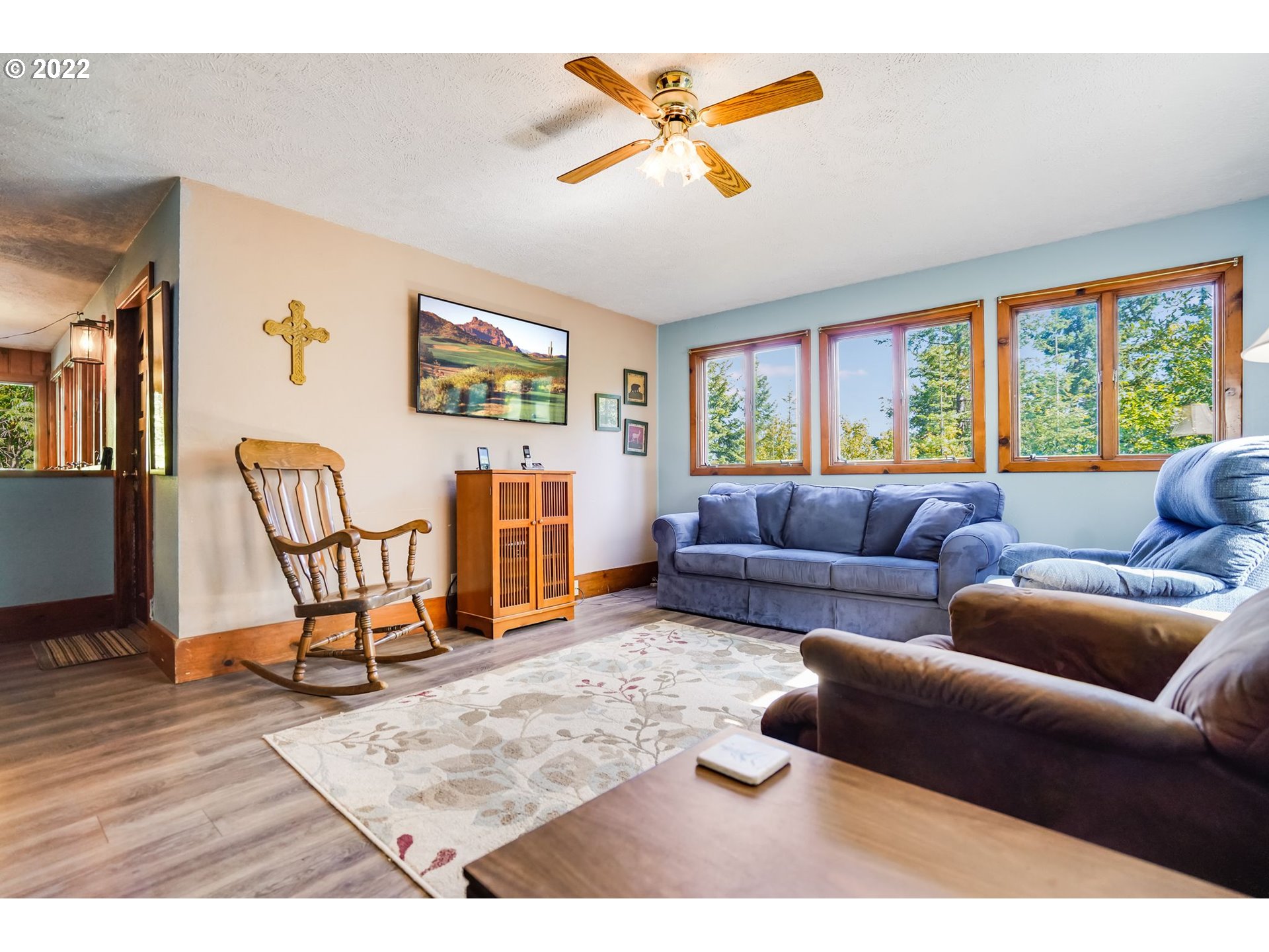 277 Trout Lake Creek Road Trout Lake, WA 98650 - Photo 24 of 35 a living room with furniture and a flat screen tv
