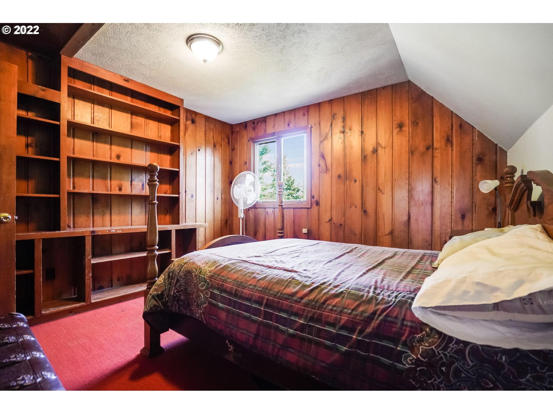 277 Trout Lake Creek Road Trout Lake, WA 98650 - Photo 31 of 35 a bedroom with a bed and closet