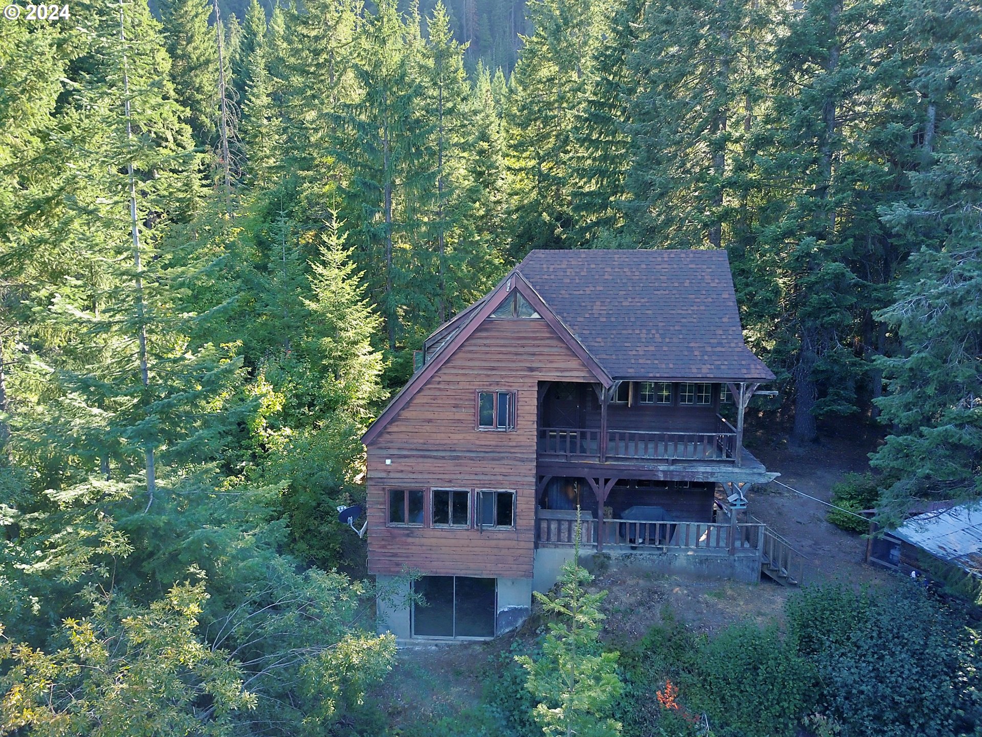277 Trout Lake Creek Road Trout Lake, WA 98650 - Photo 35 of 35 an aerial view of a house next to a yard