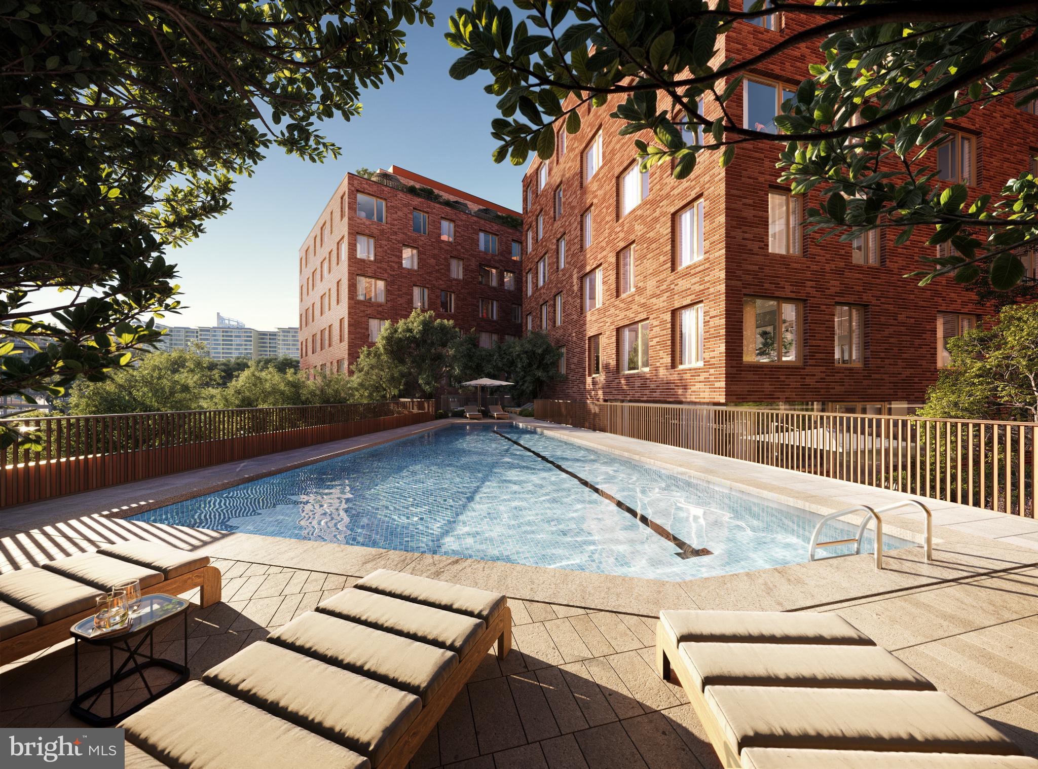 5300 Wisconsin Avenue Northwest, Unit TH10/VARIES Washington, DC 20015 - Photo 3 of 29 a view of a house with a yard