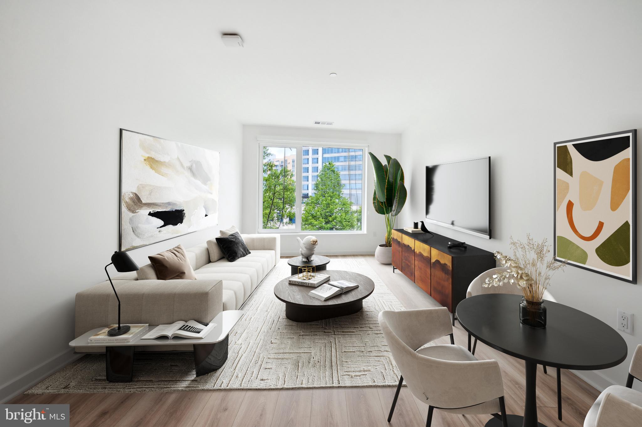 5300 Wisconsin Avenue Northwest, Unit TH10/VARIES Washington, DC 20015 - Photo 10 of 29 a view of a dining room with furniture window and outside view