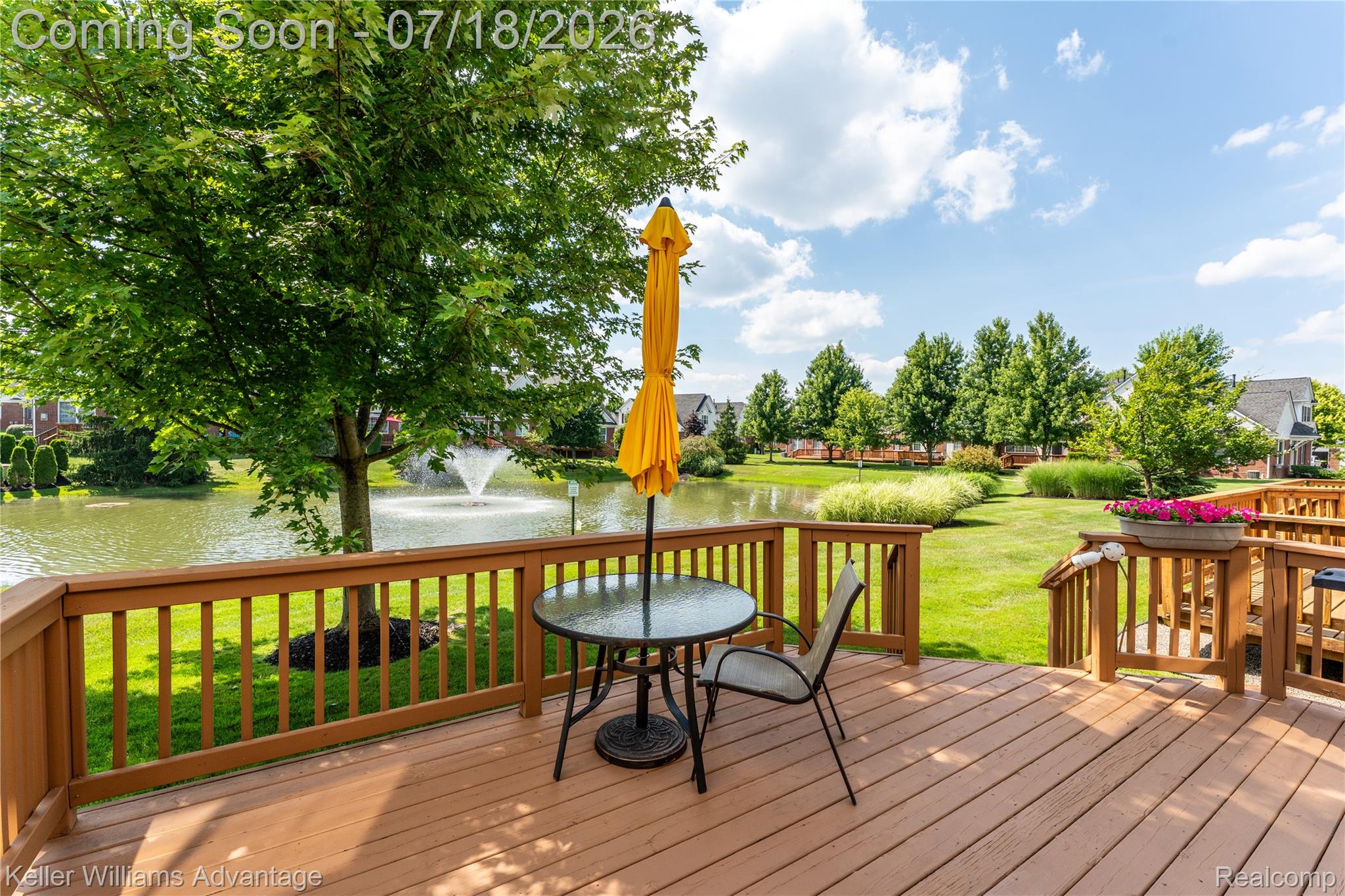 41647 Mitchell Road Novi, MI 48377 - Photo 11 of 43 Expansive outdoor deck featuring wood-finish decking and railings