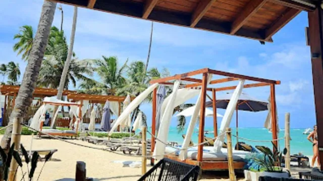 a view of swimming pool with outdoor seating