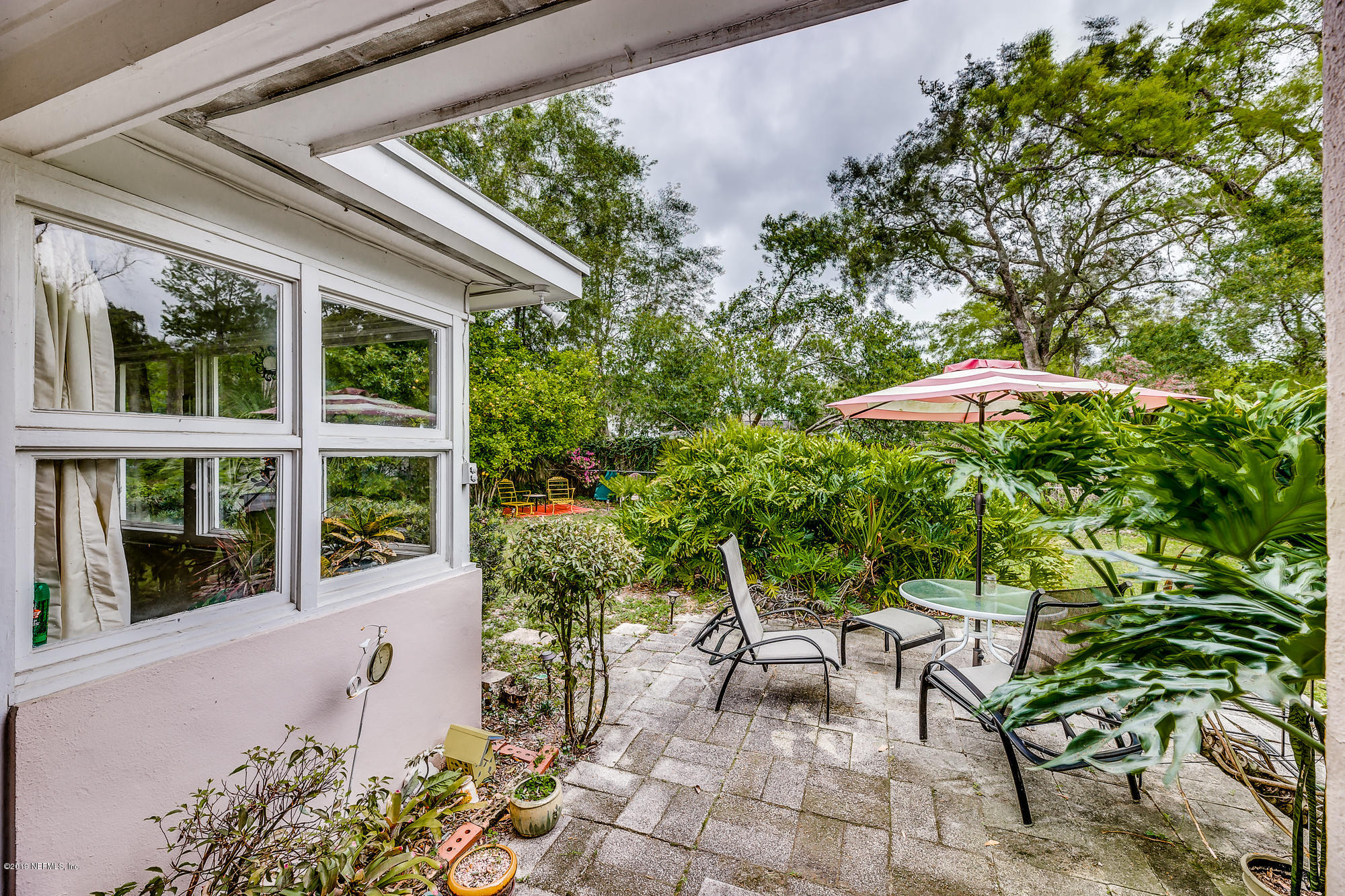 6403 Wesleyan Road Jacksonville, FL 32217 - Photo 14 of 37 a garden view with a seating space