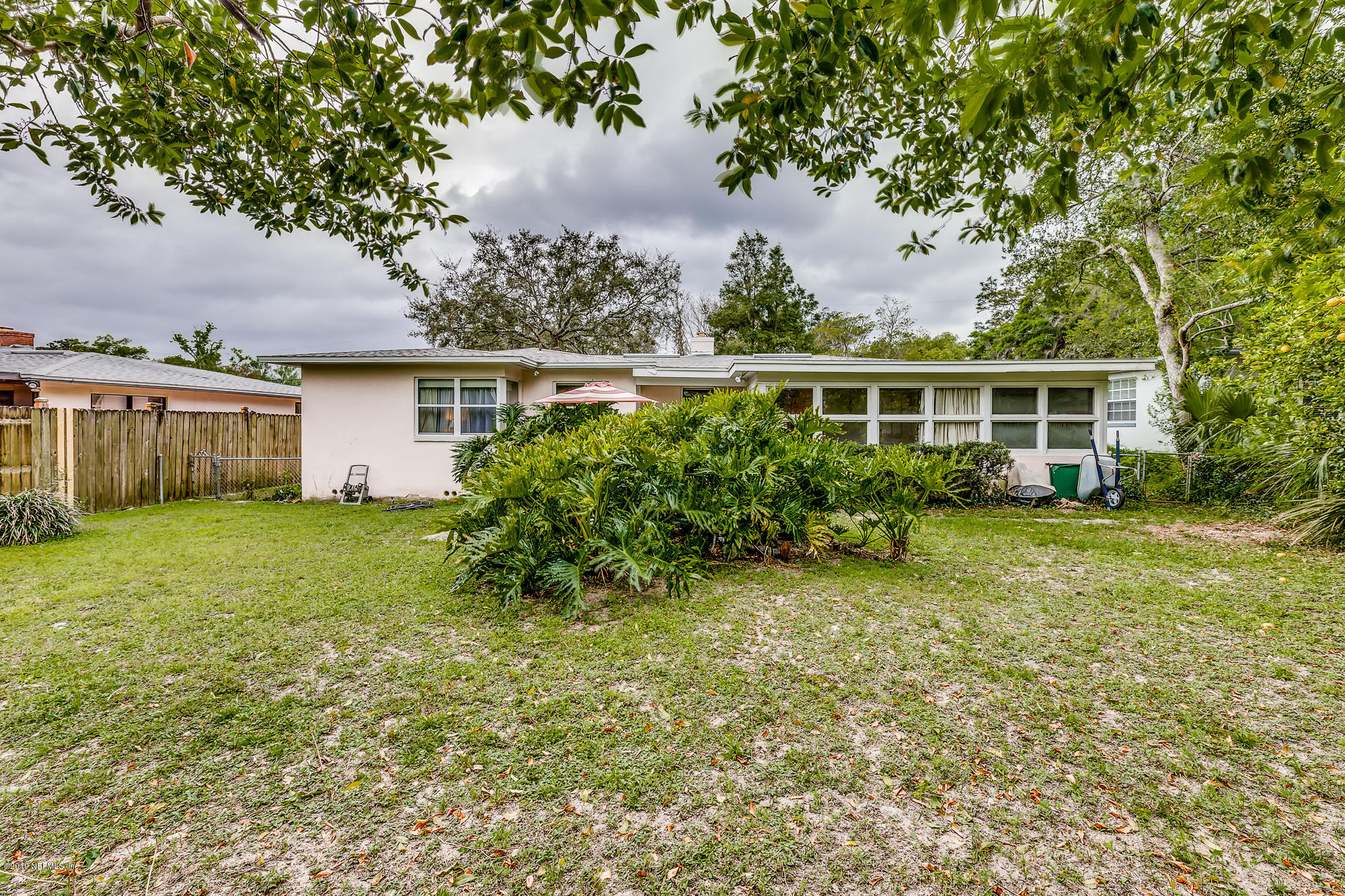 6403 Wesleyan Road Jacksonville, FL 32217 - Photo 8 of 37 a view of a house with a yard